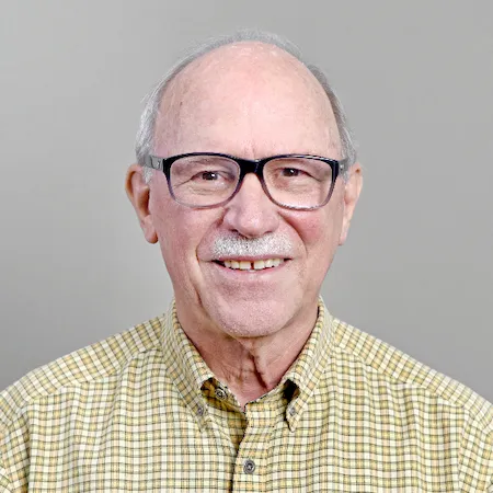 A headshot of Charles Redman